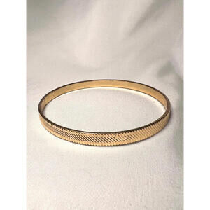 Vintage gold toned ridged quiet luxury thin bracelet